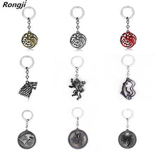 Load image into Gallery viewer, Movie Seriers Game of Throne House Stark keychain 3 Colors Alloy The Song Of Ice and Fire Targaryen Dragon  Badges Keyring Gift